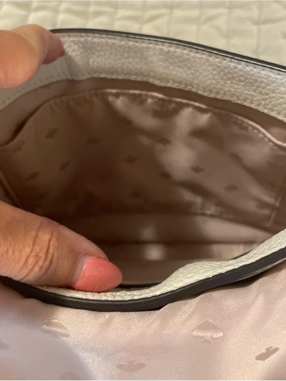 kate spade cream pebbled leather crossbody with gold logo